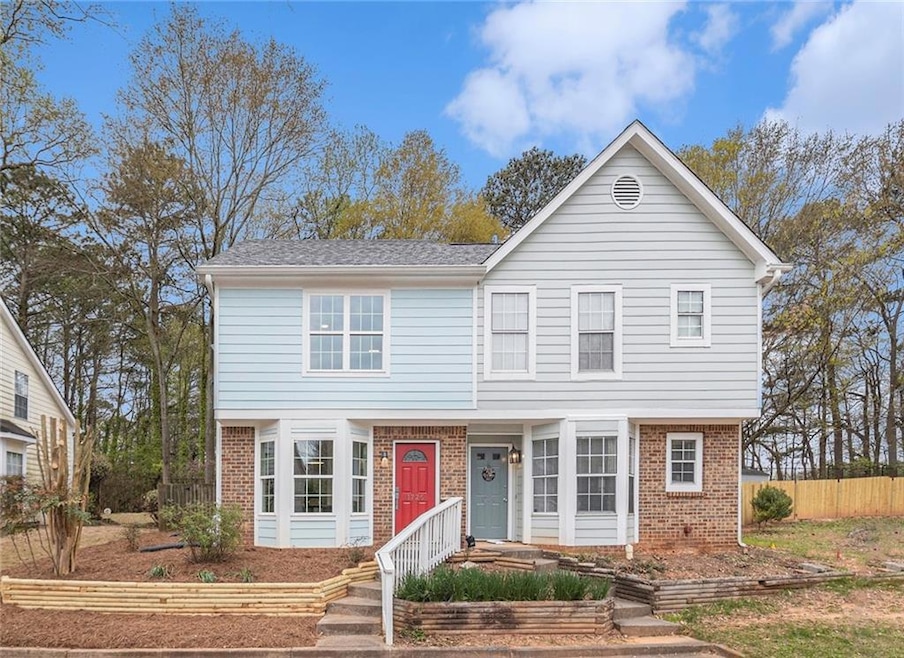 Front View--1726 is on the left with the red door