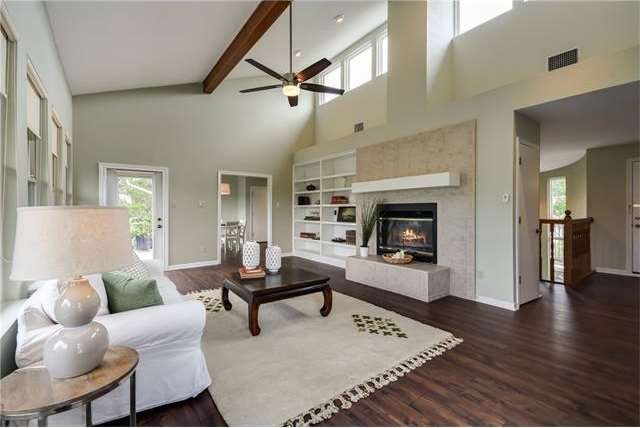The family room is spacious and filled with natura