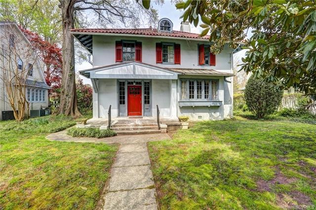 Historic 1919 Craftsman with Spanish Terra-cotta Tile Roof and original wood front door.