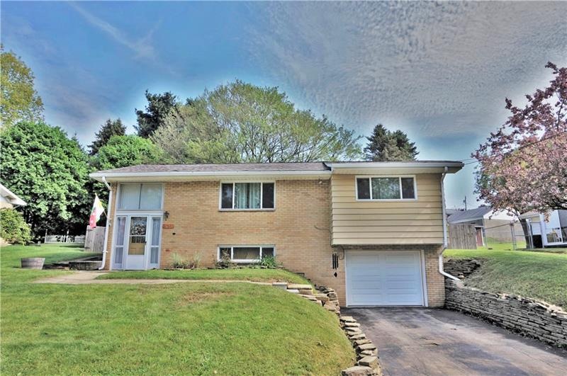 Great curb appeal!  New steps from the driveway to