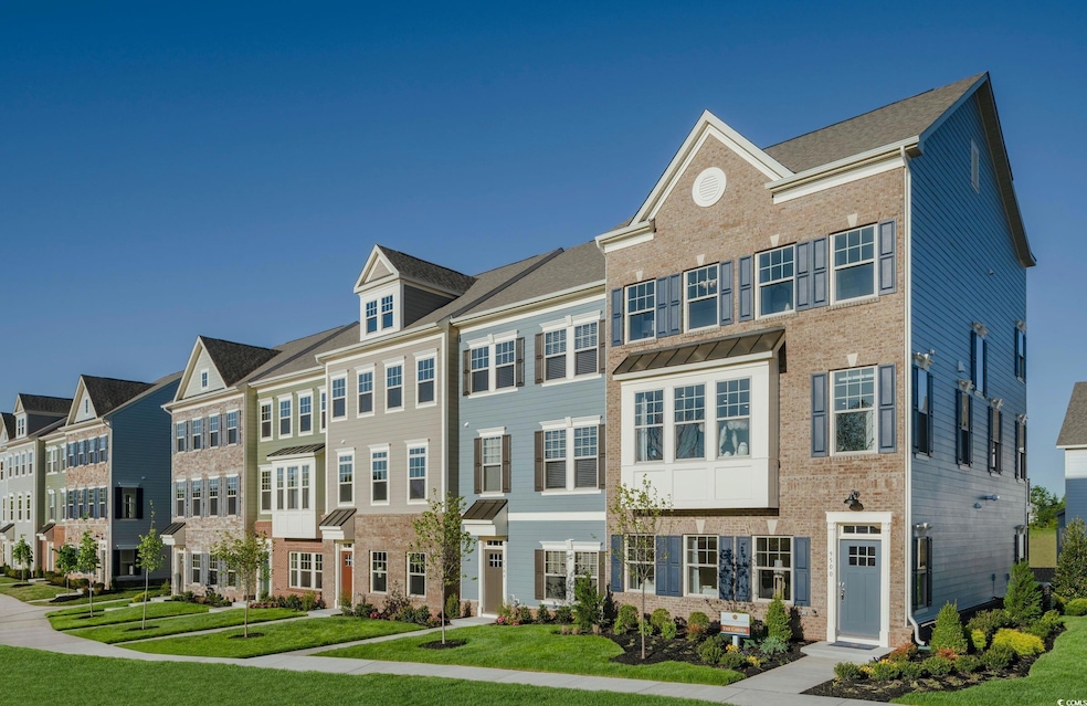 Multi unit property featuring a front yard