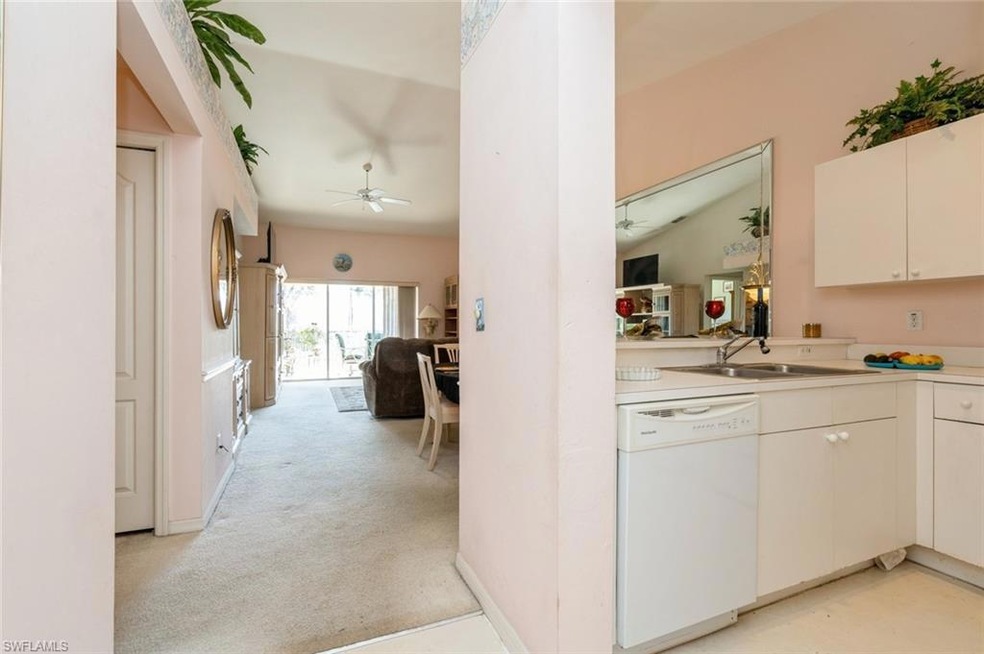 Kitchen with white cabinetry, dishwasher, ceiling 