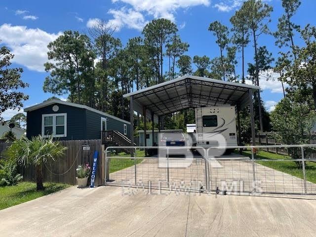 Exterior space featuring a carport
