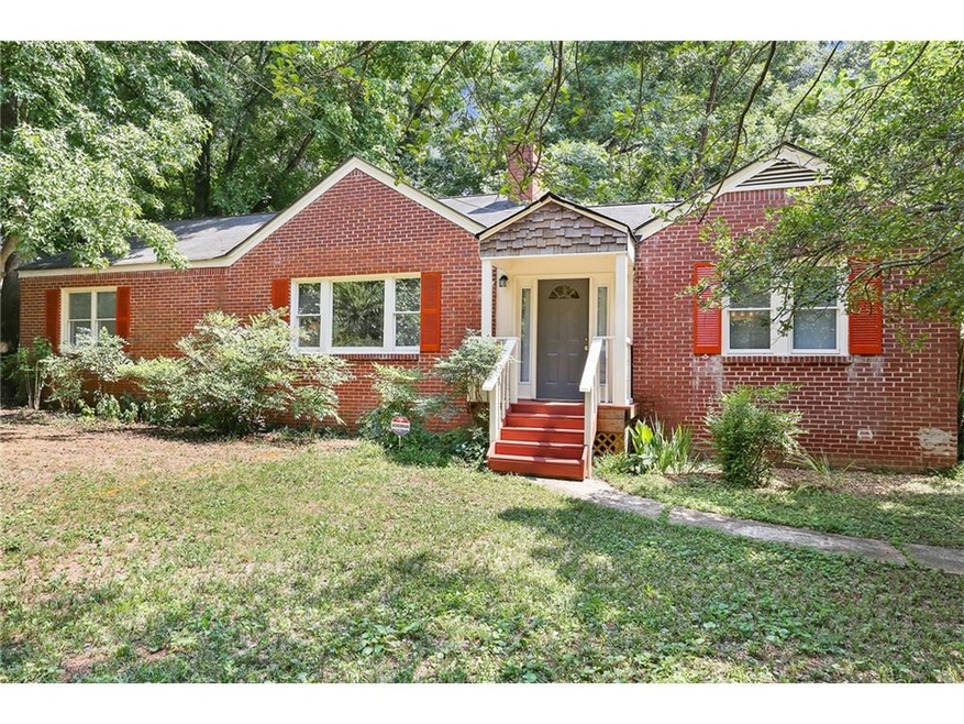 This lovely all-brick home is on one floor, on a d