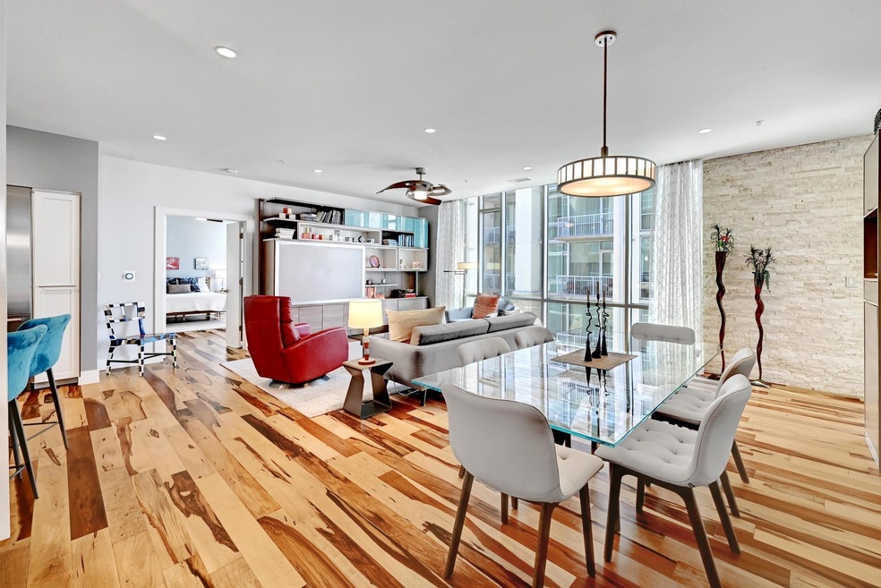 Dining area featuring light wood finished floors 