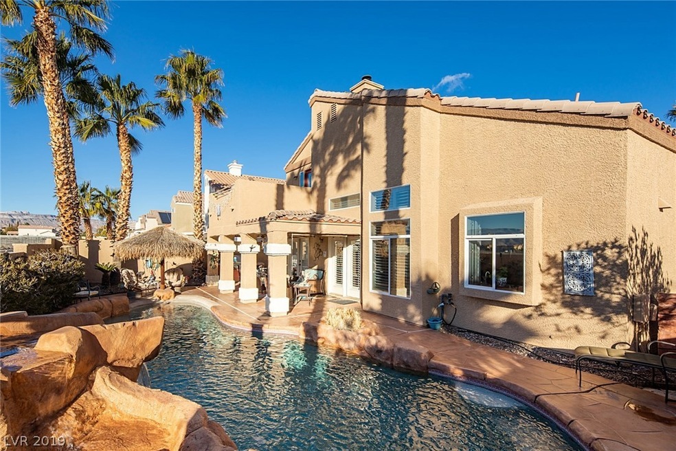 Tropical Pool with waterfall, covered patio, walk