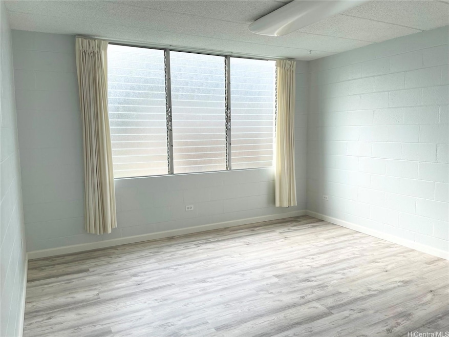 Fresh and breezy Living room with luxury vinyl pla