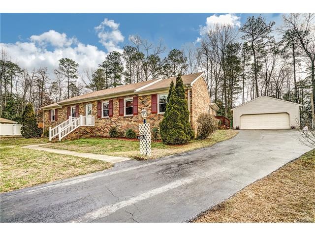 Welcome to 4801 E Gurney Ct.....great brick ranche