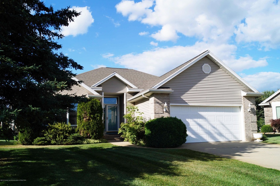 517 White Pine Blvd, Lansing, MI 48917 - photo 1