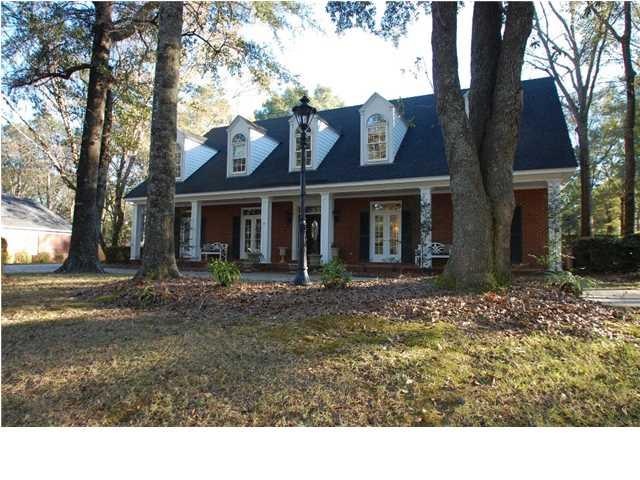 Gorgeous brick Creole Cottage.