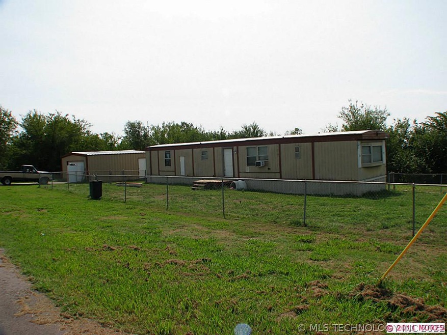 1 acre m/l.  Two-car garage with electricity.  Sel