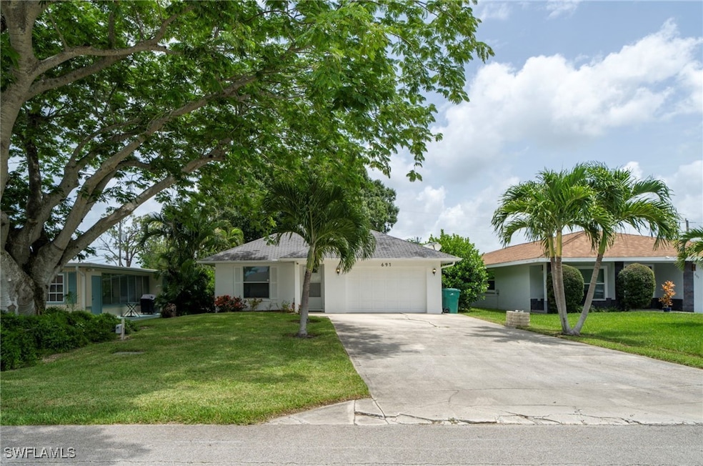 691 102nd Ave N, Naples, FL 34108 - photo 1