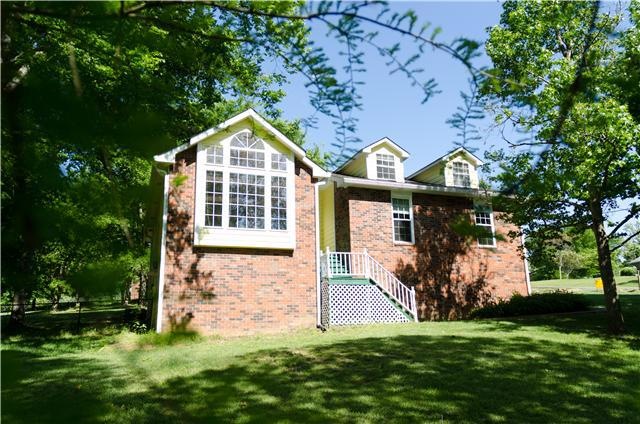 Welcome home to this beautiful house nestled upon an acre treed lot. Great neighborhood in a fabulous location.  OPEN HOUSE June 17th - 2pm to 4pm.