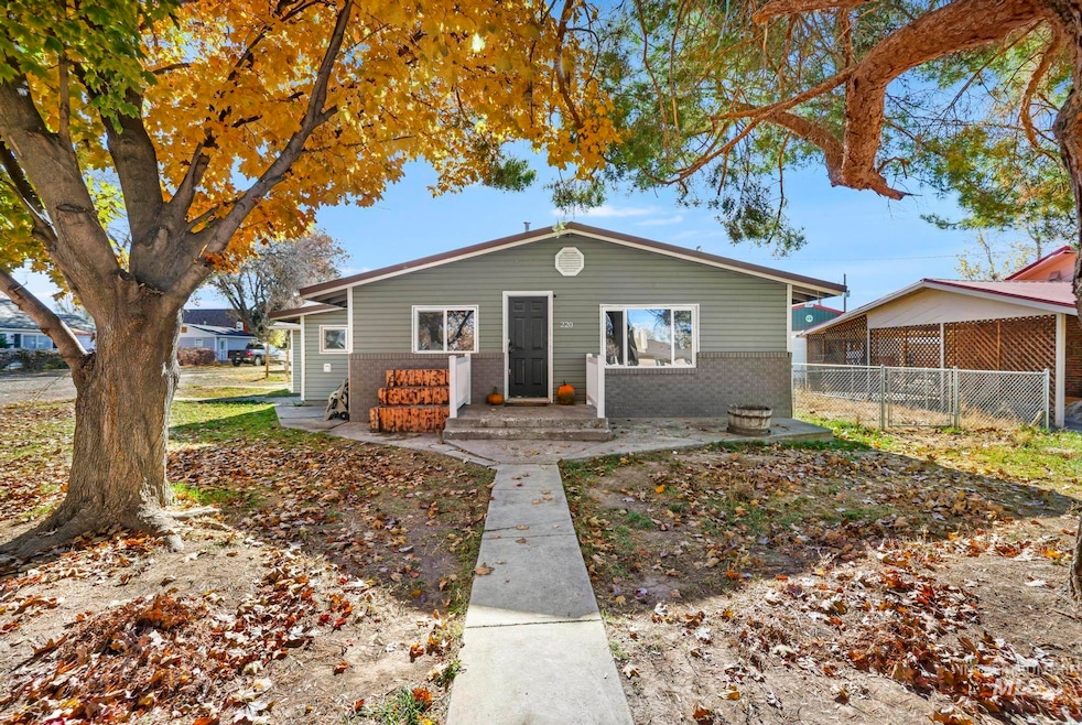 View of front of home featuring brick siding