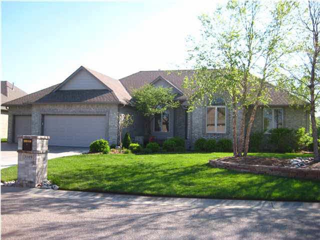 Gorgeous mature landscaping combined with 5 BR's (