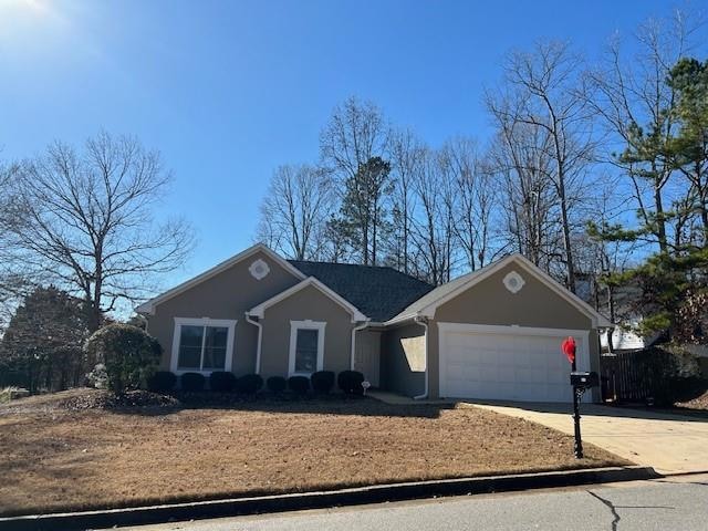 Single story home with a garage