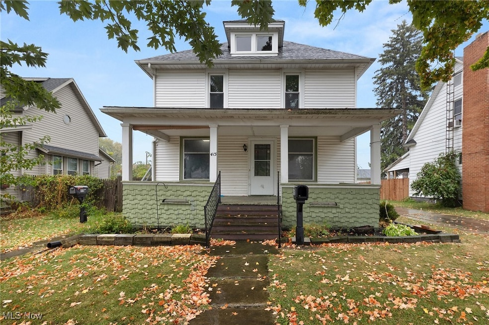 Traditional style home featuring covered porch
