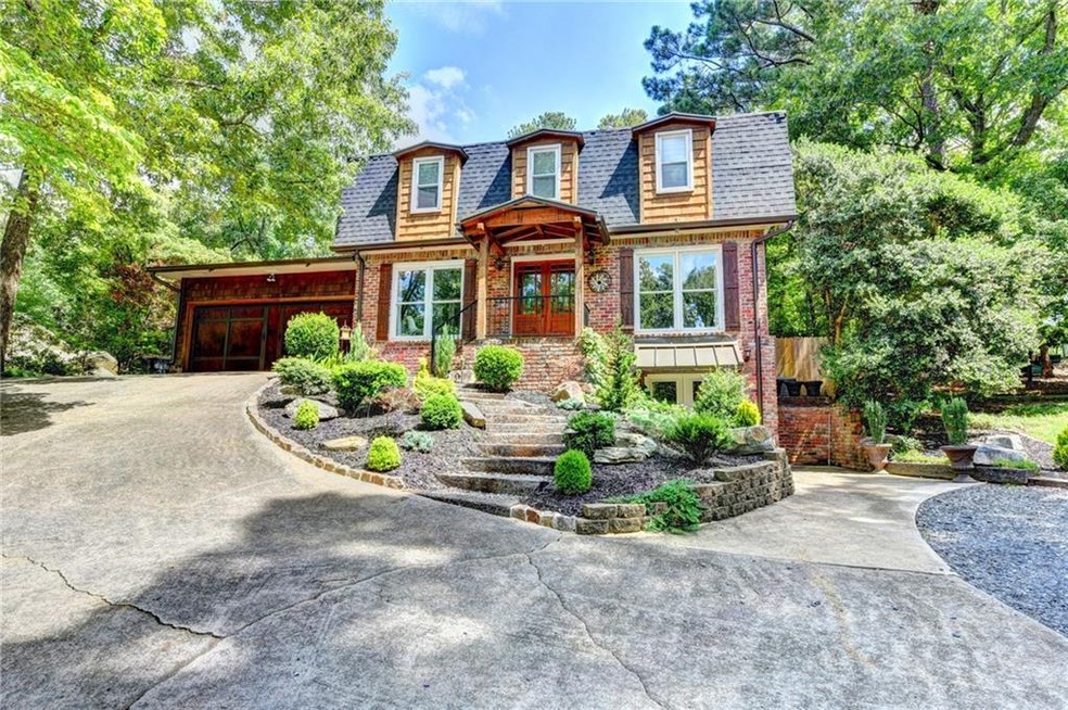 Brick and cedar home with tons of parking and acce