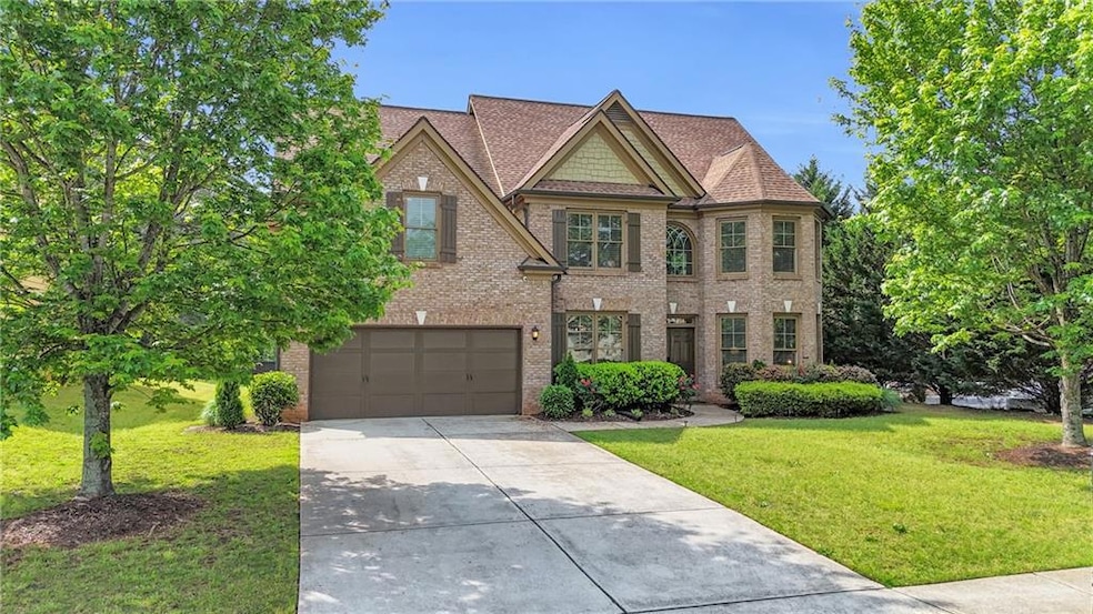 Traditional-style house featuring a front yard, dr