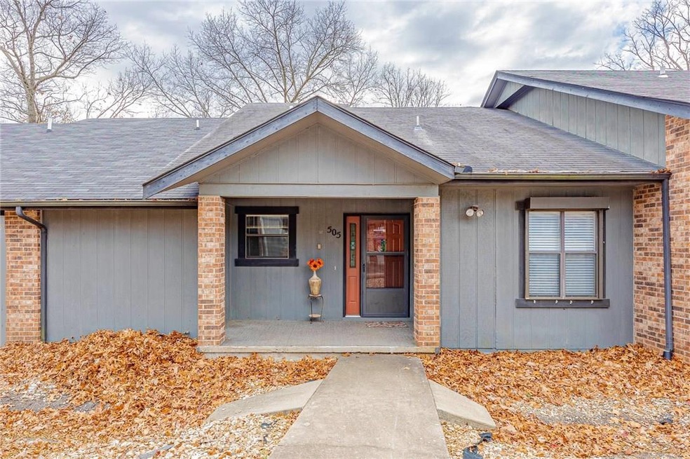 An adorable unit with a spacious covered front porch (AND 2 car carport!)