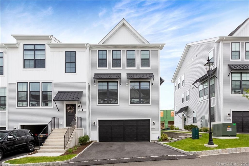 Welcome home to your End unit at 8 West Cross Trai