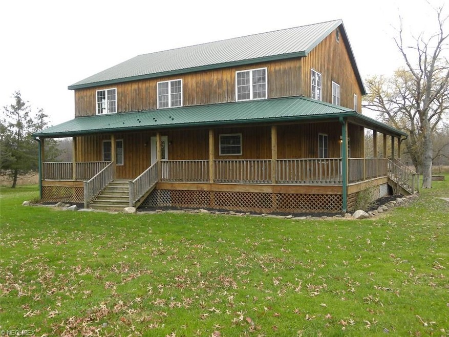 Spacious 4 bedroom farmhouse on 26+ acres with met