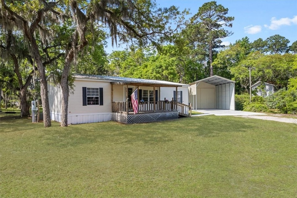 1230 Thompson Dr NE, Shellman Bluff, GA 31331 - photo 1