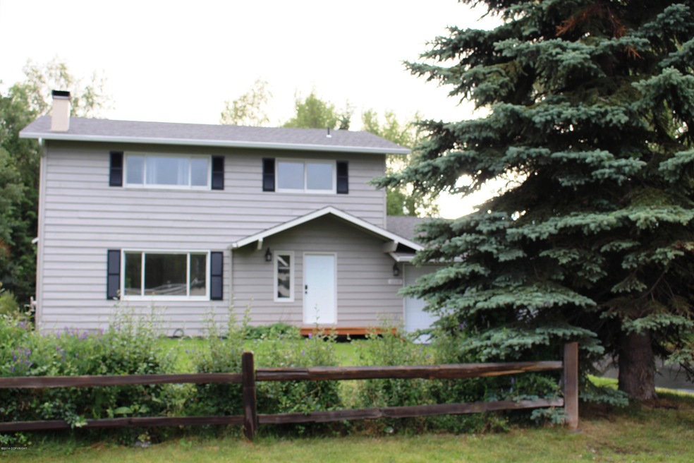 Treed landscaped front yard