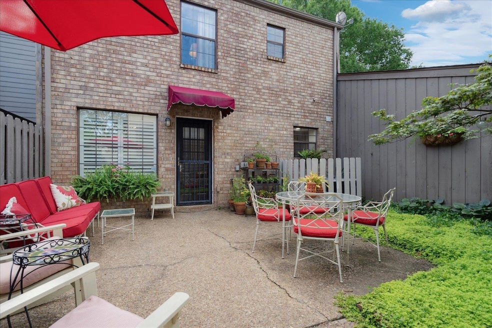 View of patio with an outdoor hangout area