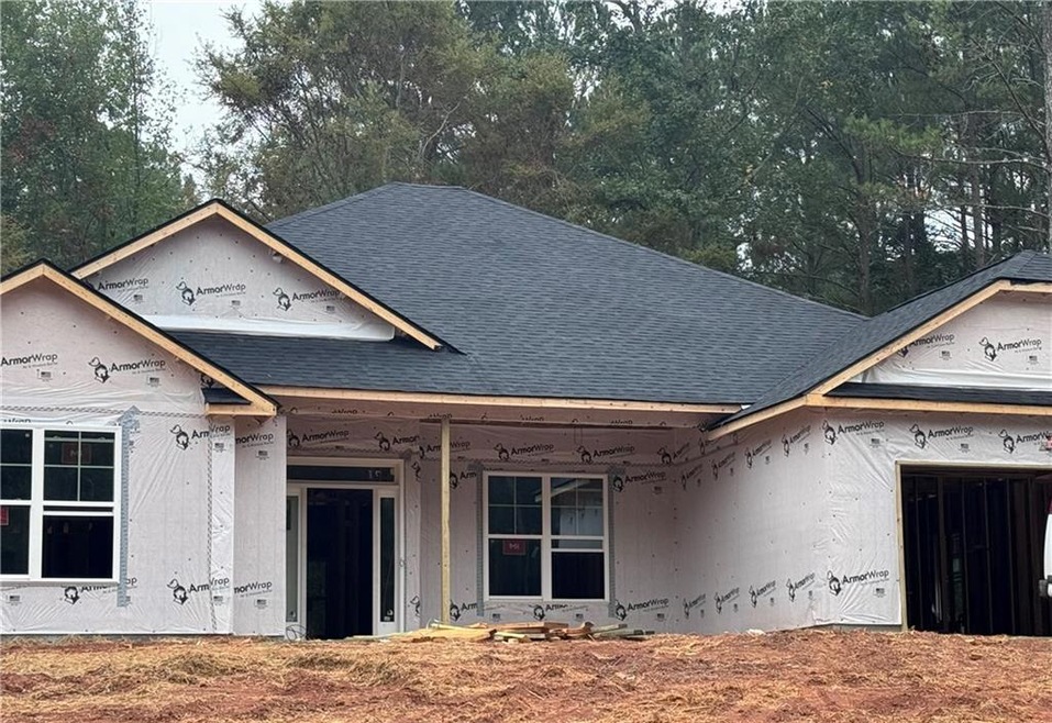 ACTUAL HOME -FRONT ELEVATION W/ CAR FRONT ENTRY GA