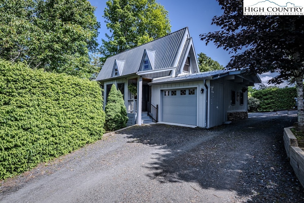 Front of home showing drive thru garage
