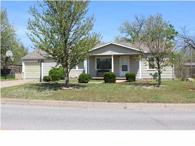 This wonderful home sits on nearly a half acre and