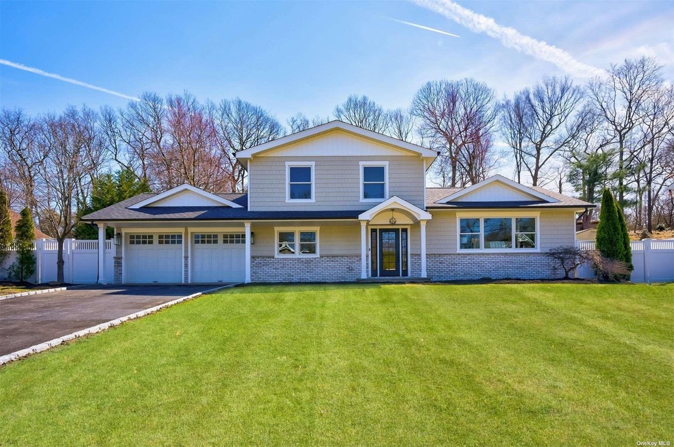 CURBSIDE VIEW of TOTALLY RENOVATED HAUPPAUGE HOME