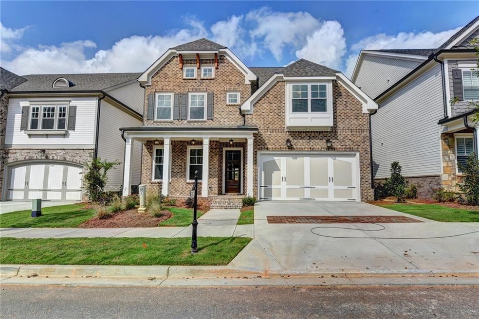 Craftsman house featuring a garage