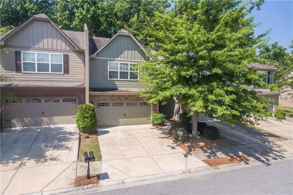 View of front facade featuring a garage