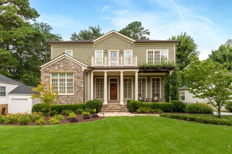Lovely 3 story home with 10' ceilings and spacious