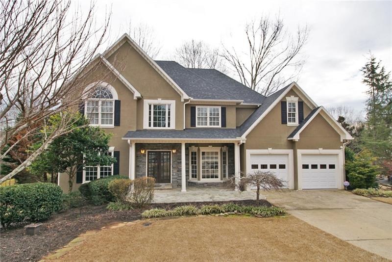 Striking Hard Coat Stucco with Stone and Covered P