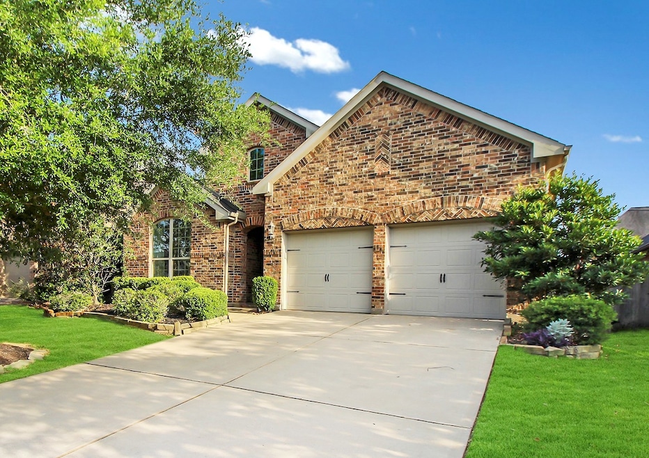 Welcome Home to 29015 Pinnacle Ridge Drive! Just look at this beautiful home nestled on a quiet street in Firethorne.