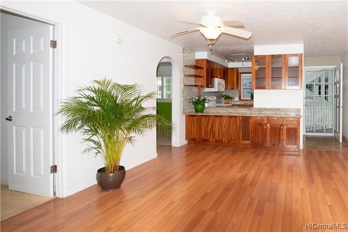 Living room with built in cabinets and buffet coun