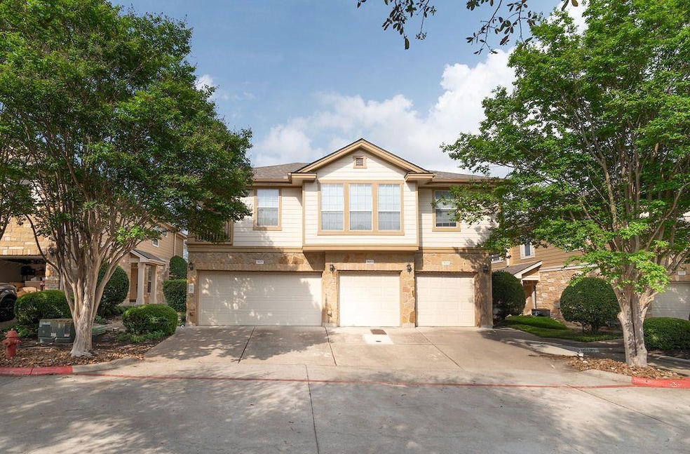 Multi unit property featuring an attached garage 