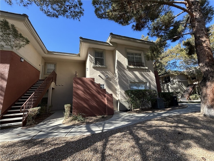 View of front of home with stucco siding, central
