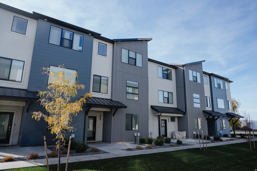 Contemporary home with a standing seam roof and a metal roof