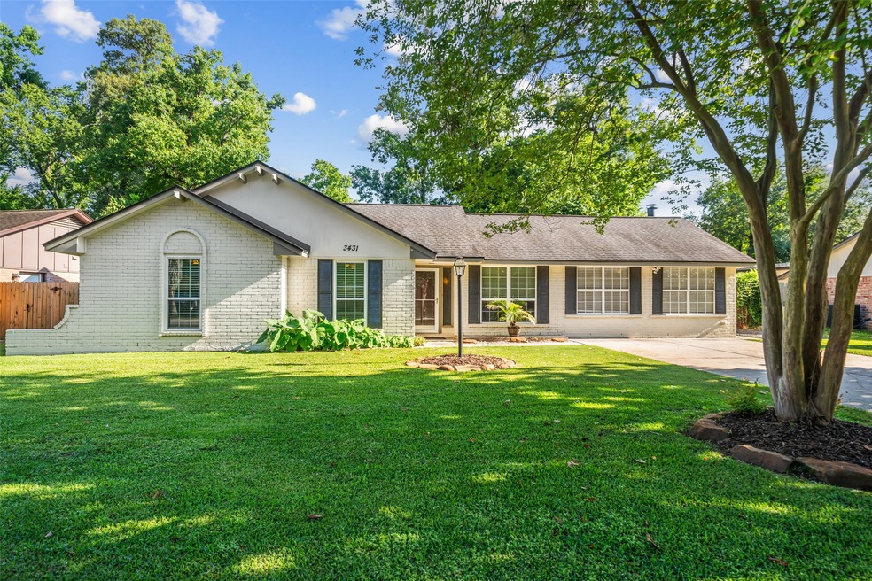 Beautiful brick home with new windows along the fr