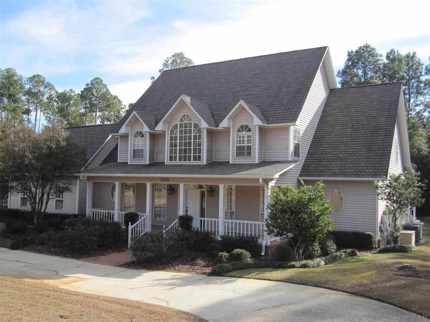 Circular drive & side entry garage w/added storage