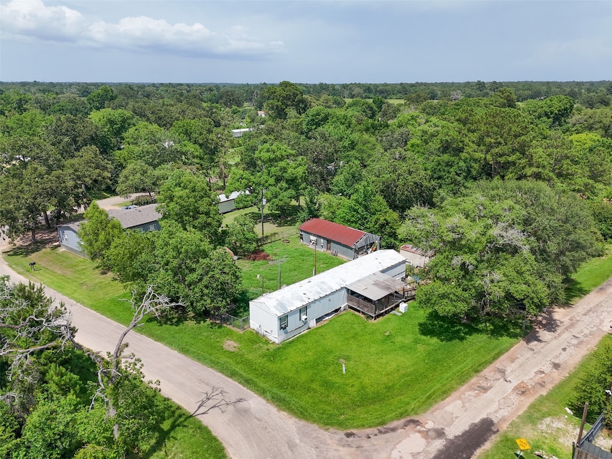 Situated on a corner lot at 25322 River Run in Hoc