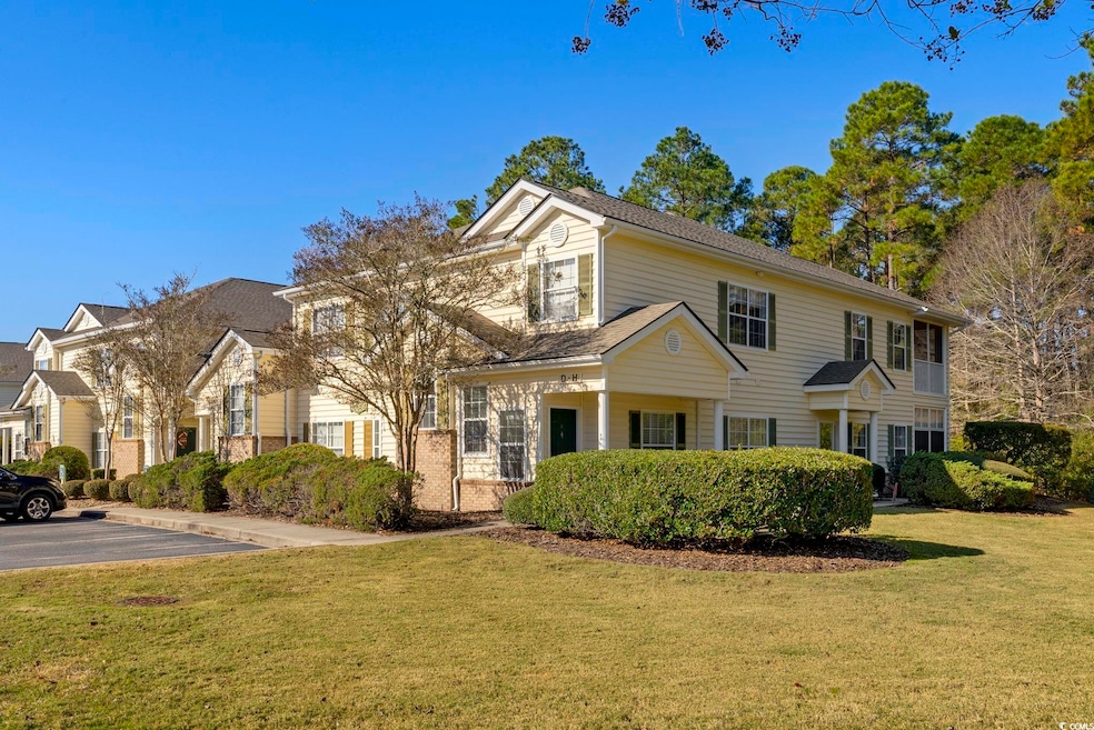 View of front of property with a front yard
