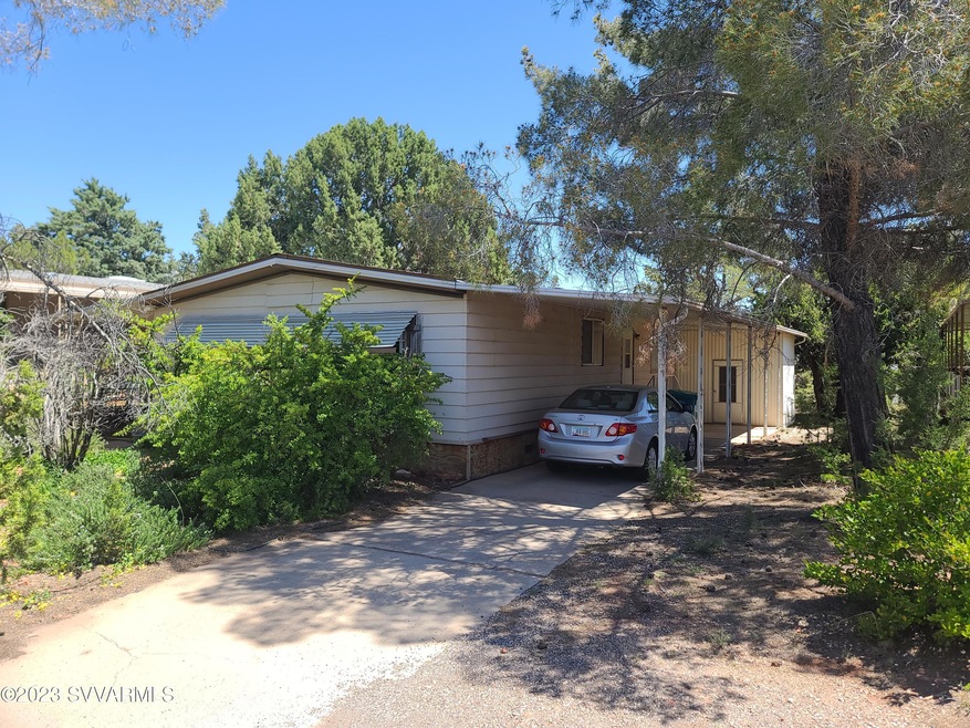 Pic front of home with carport