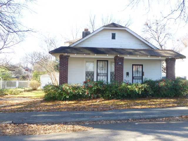 Formerly duplex with two front doors.  Could easil