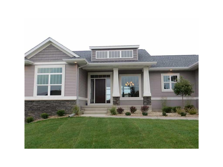 Front Exterior. Stacked Stone, Custom Pillars, Sha