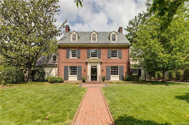 Welcome to this stately colonial slate and brick h